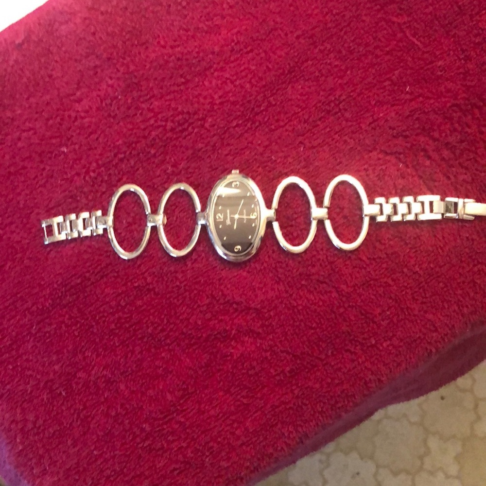 Geneva Stainless steel watch. Needs battery
